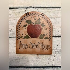 Cute little wood “home sweet home” apple pattern wall hanging.